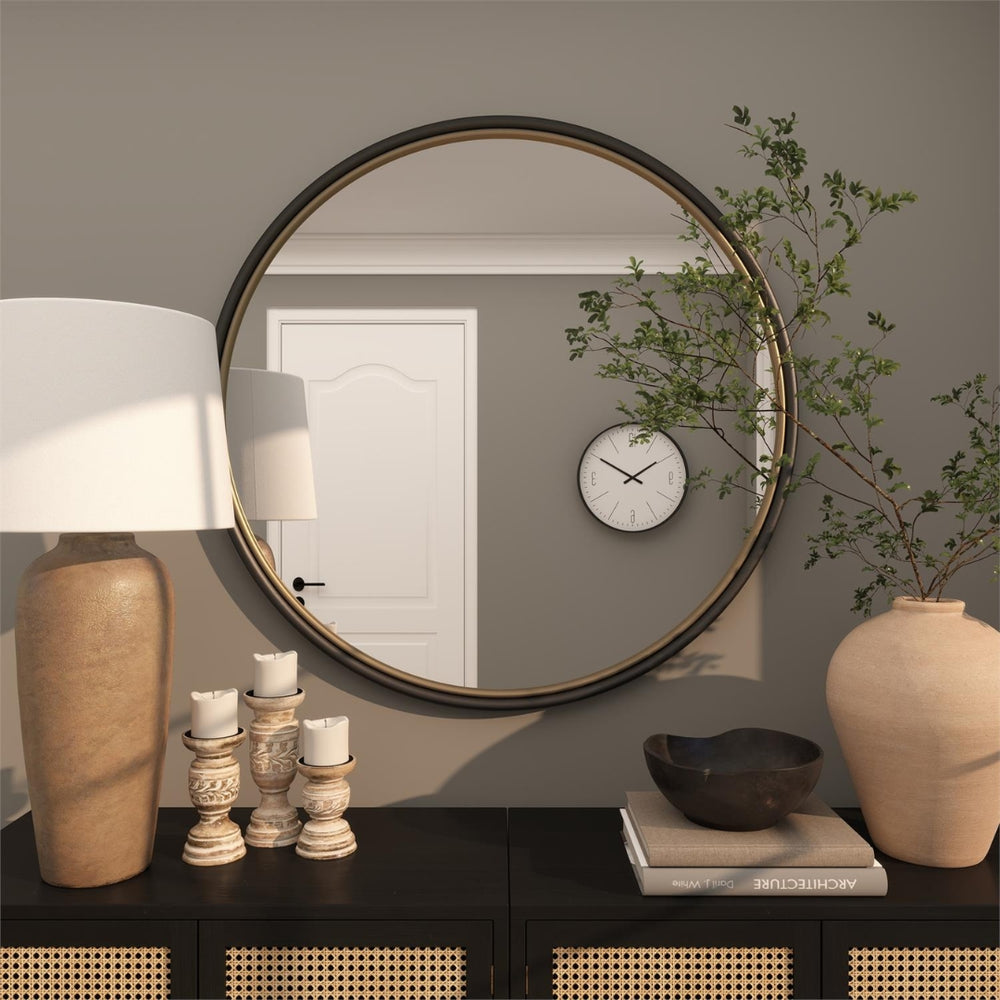Espejo decorativo redondo negro con aro interior dorado