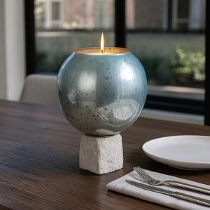 Portavelas decorativo en vidrio aqua con base de mármol