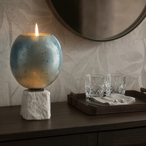 Portavelas decorativo en vidrio aqua con base de mármol