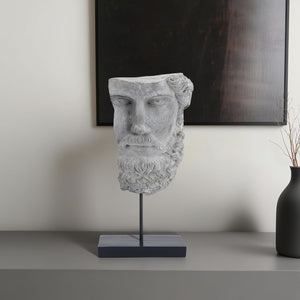 Escultura abstracta de media cara