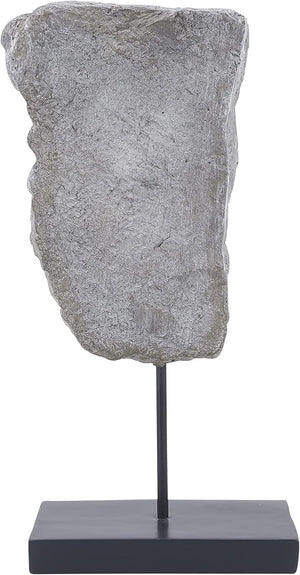 Escultura abstracta de media cara